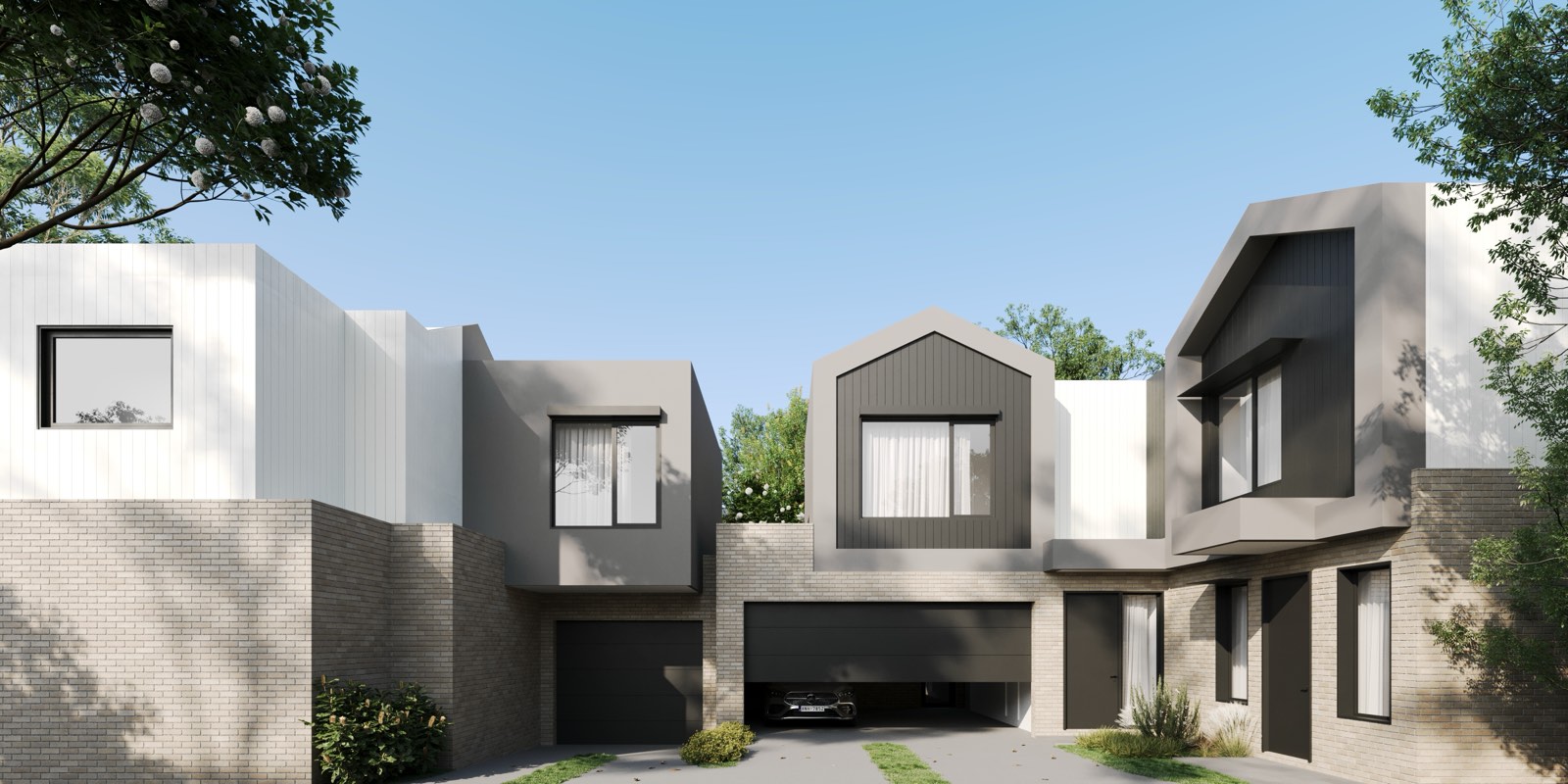 Render of the three-townhouse Mount Waverley scheme from the central driveway